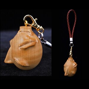 Berserk Behelit “Egg of the King” Wooden Strap Charm