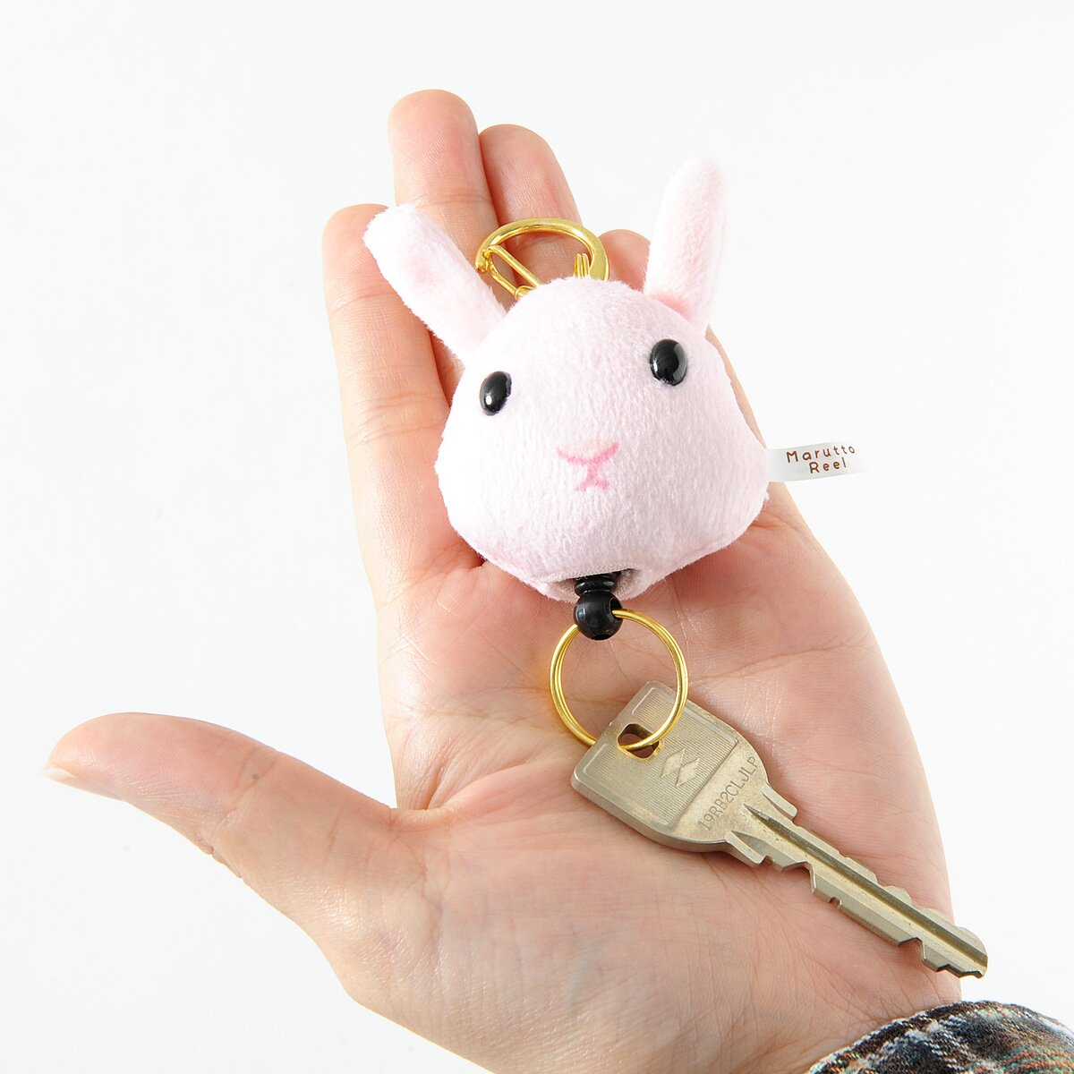 Diskret speltema: en stiliserad kanin som symboliserar fart och lekfullhet