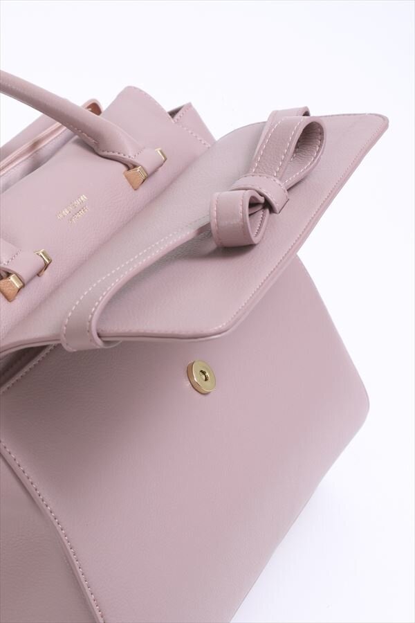 Premium Photo | A pink ribbon ribbon purse charm for a touch