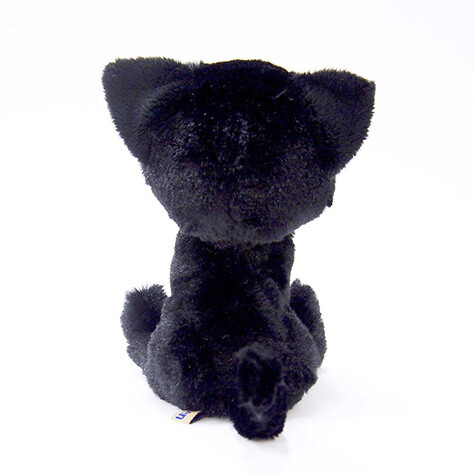 plush black cat with green eyes