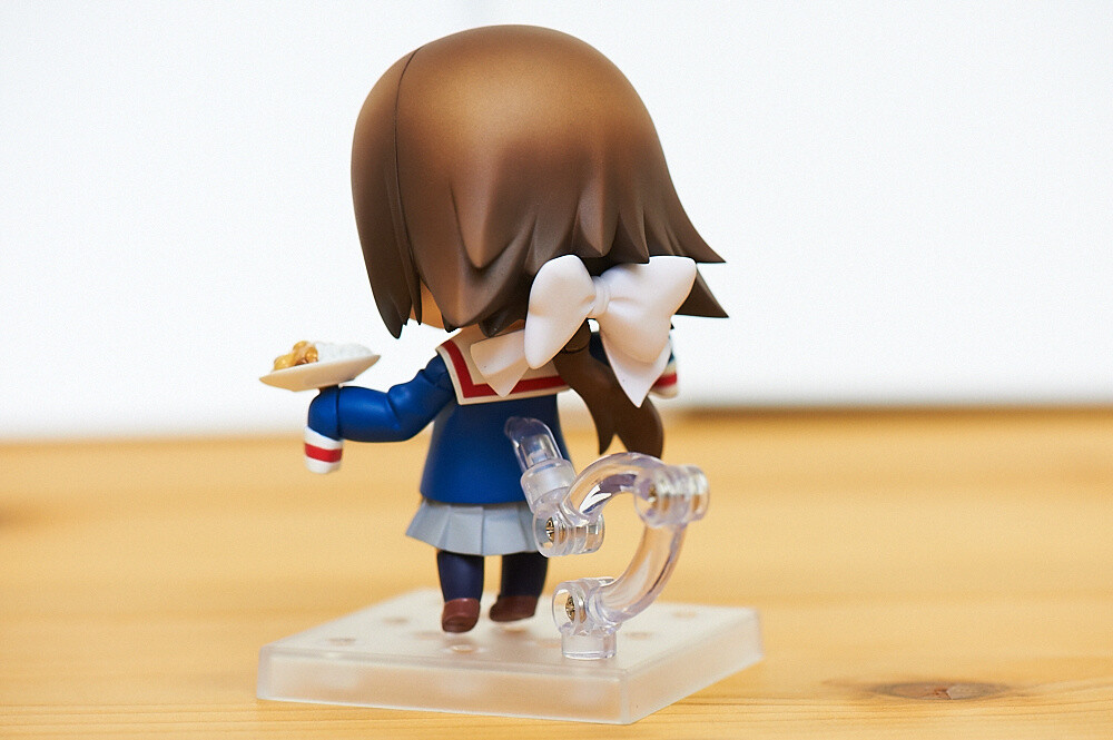 She has a big ribbon on her back. 29