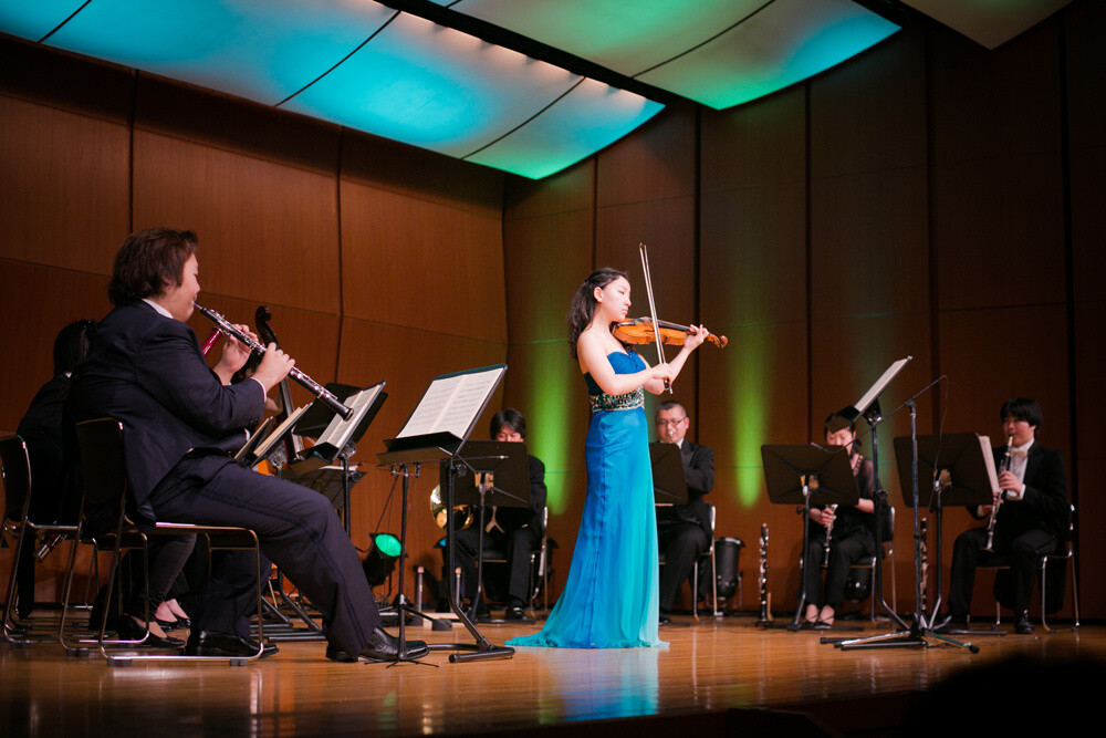 In the center is violinist Ami Oike as she plays music from the *Final Fantasy* series. 4