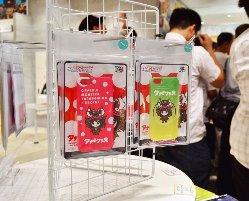 The iPhone cases show off a cute illustration of Tanamiclas. 2