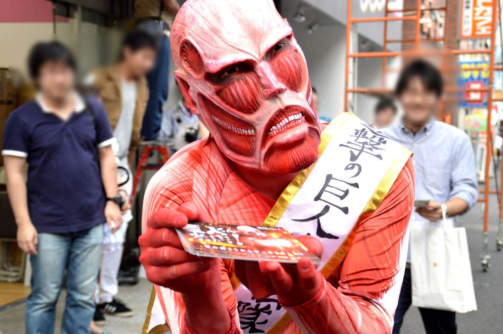 The Titan enthusiastically handing out post cards. 22