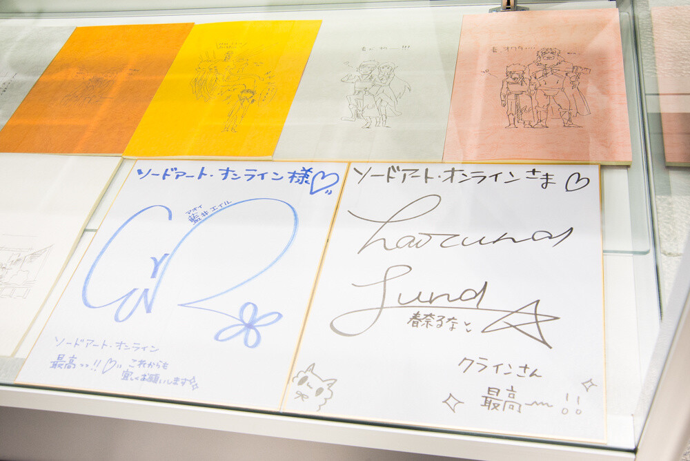 A drawing signed by the two artists who sing the theme songs 11