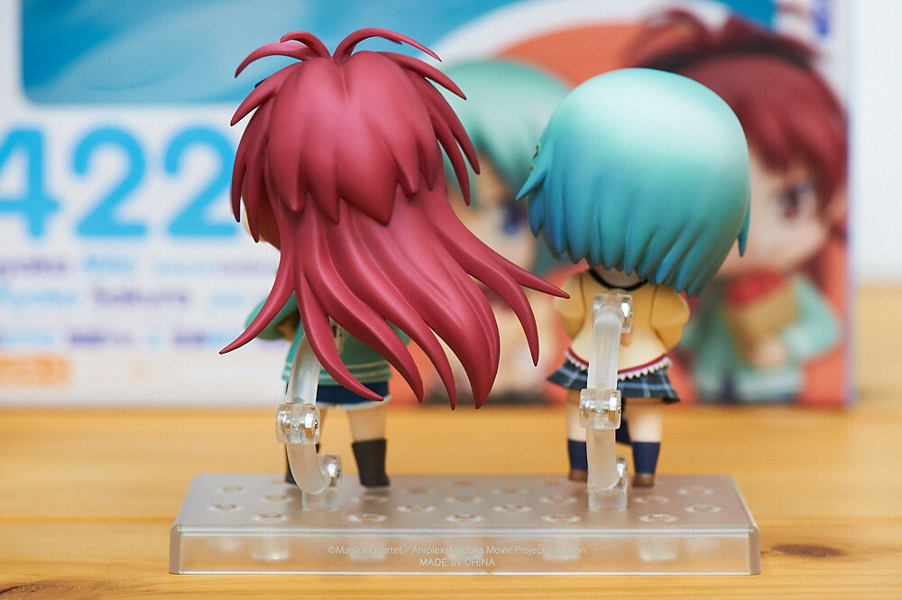 Sayaka Miki and Kyoko Sakura from behind. The floating ponytail is very nicely done. 3