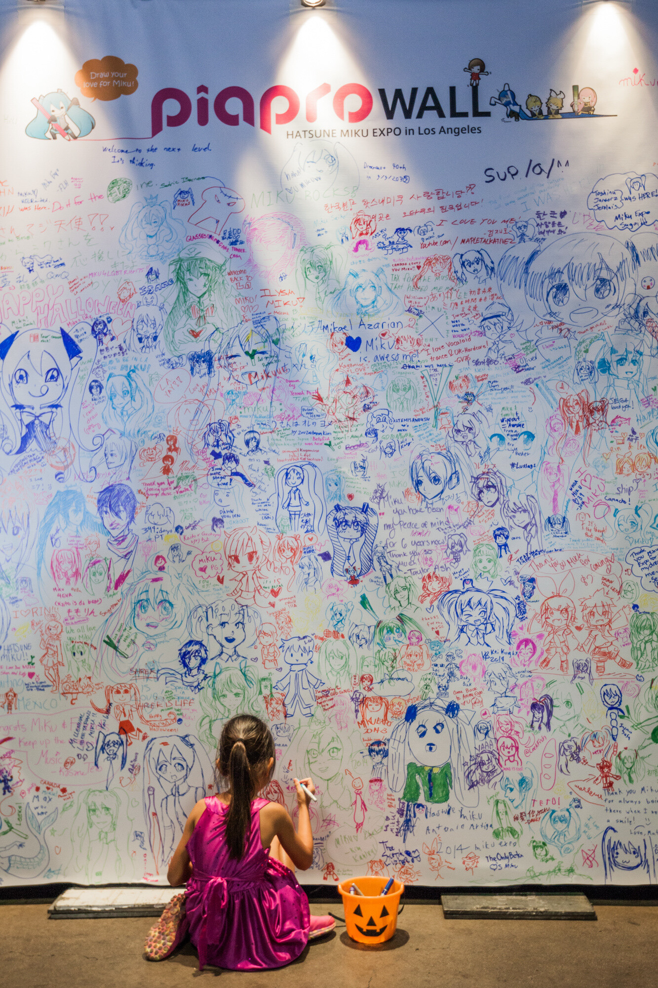 A wall filled with drawings of Miku. MIKU EXPO 2014 in LA: Photo by Kumo Takeda 4