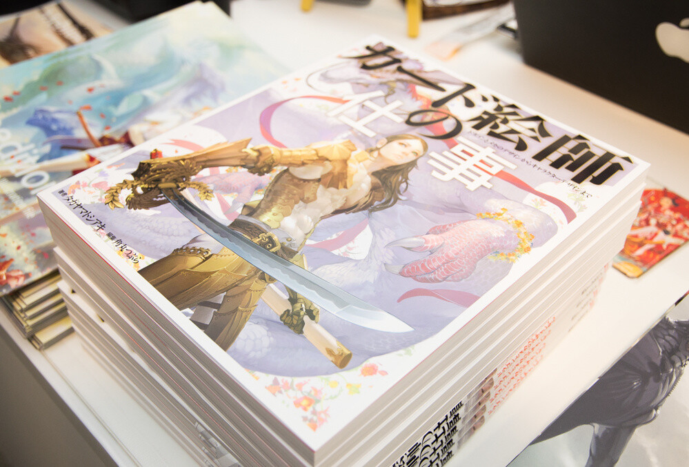 Takayama’s art book released on April 30, *The Work of a Card Artist: From Dragons and Mecha to Character Design*. 17