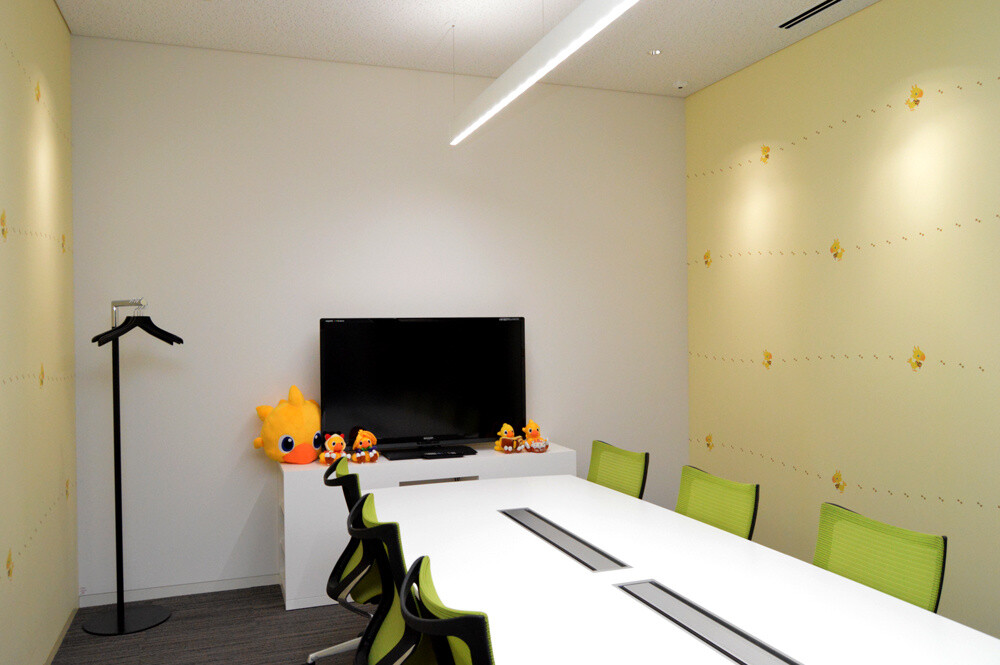 A Chocobo-colored conference room. 3