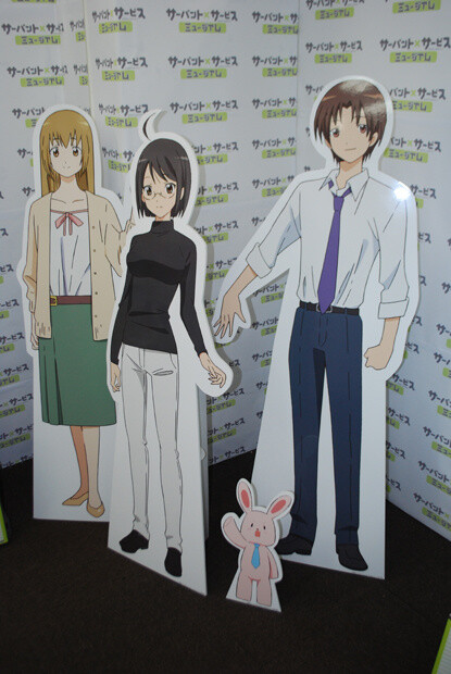 Life-size cutouts of Lucy Yamagami, Yutaka Hasabe, and Saya Miyoshi. 1
