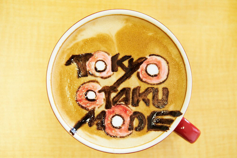 He even created a latte art of the TOM logo. The red food coloring used looks awesome! 10