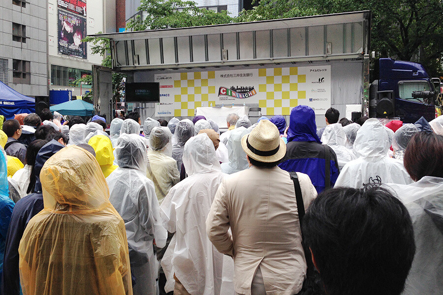 Many people were in attendance despite the rain. 11