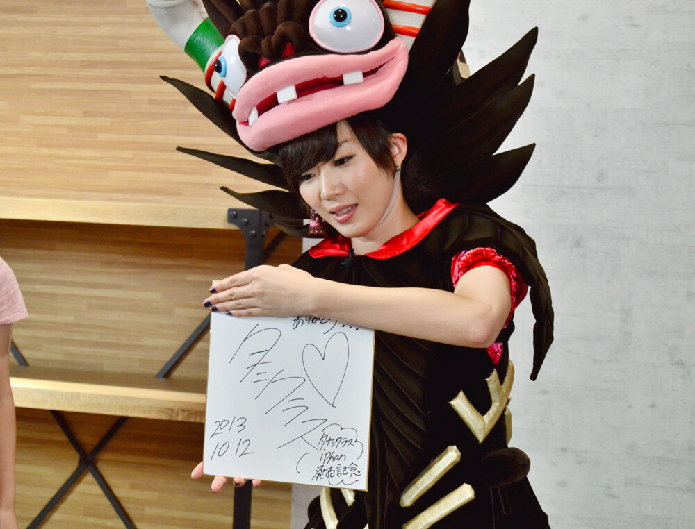 Presenting her autograph. 12