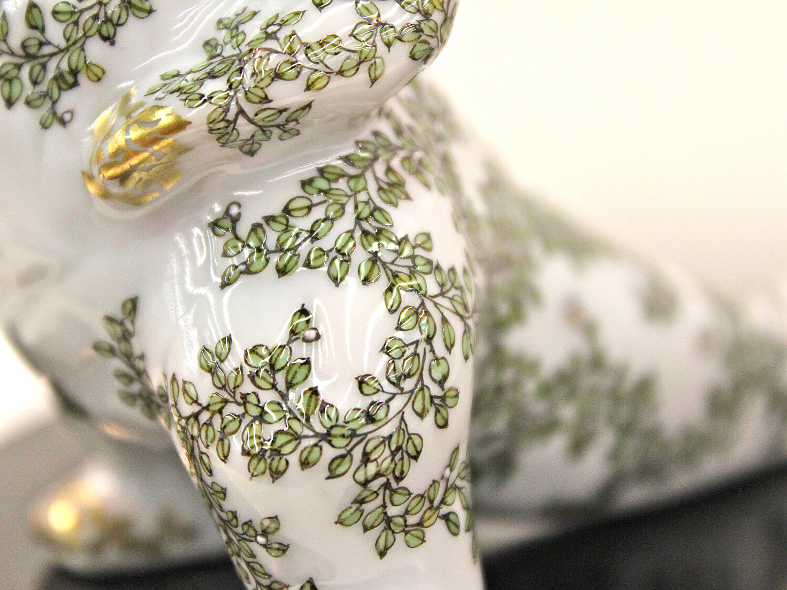 Baked as white figure before painting, then baked again, and again. Really skillful. 4