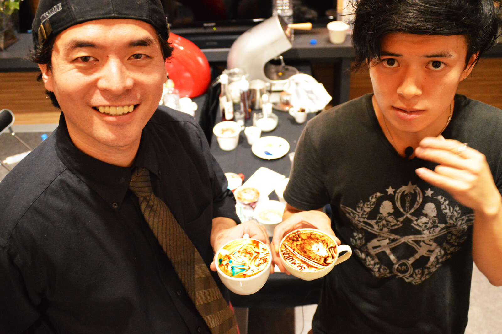 The artists posing for a photo.  27