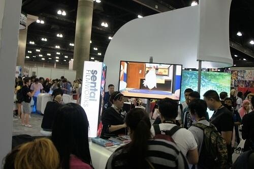 Fans visiting a booth. 5