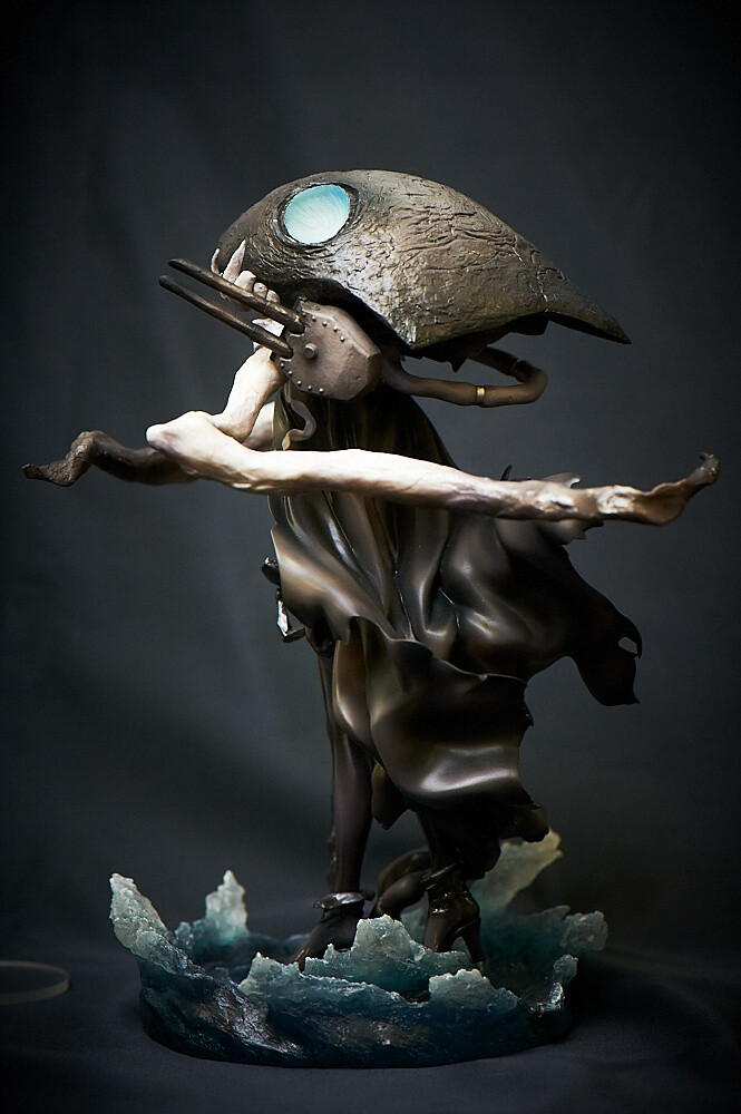 The flowing cape has been meticulously sculpted and gorgeously recreated. 63