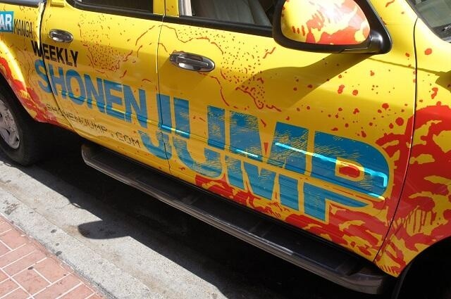 An official car covered in “Shonen Jump” decals could be seen on the street.  7