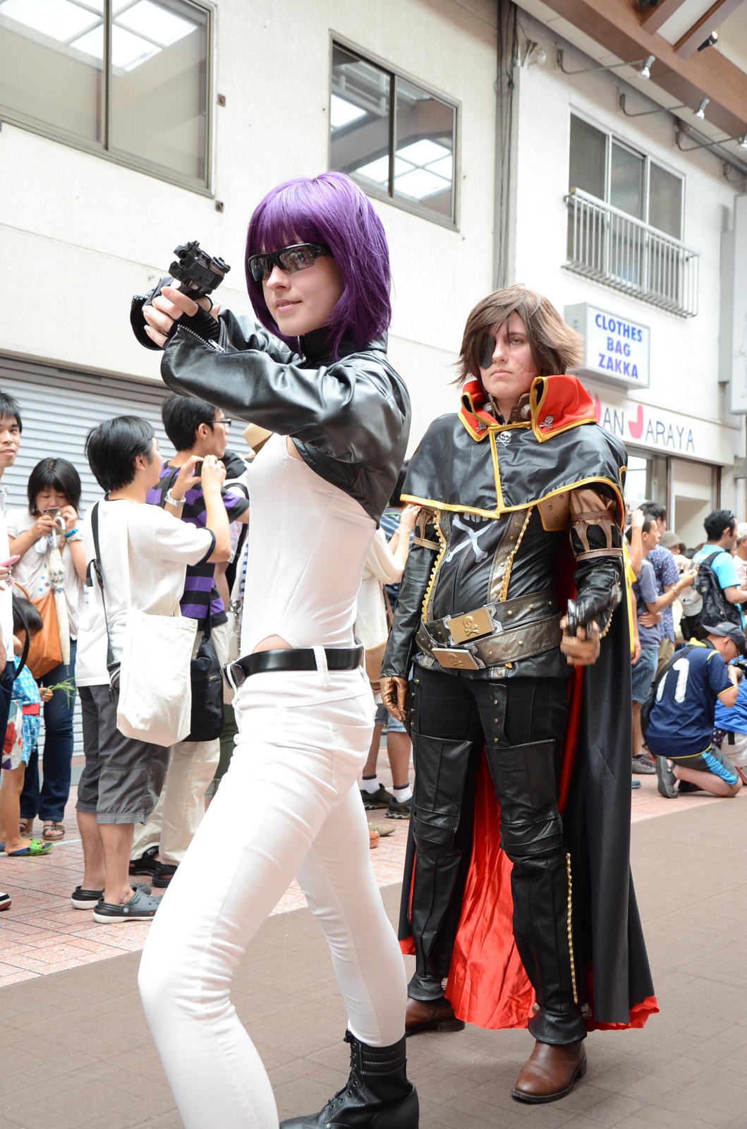 A wonderful shot of Motoko Kusanagi and Captain Harlock. 17