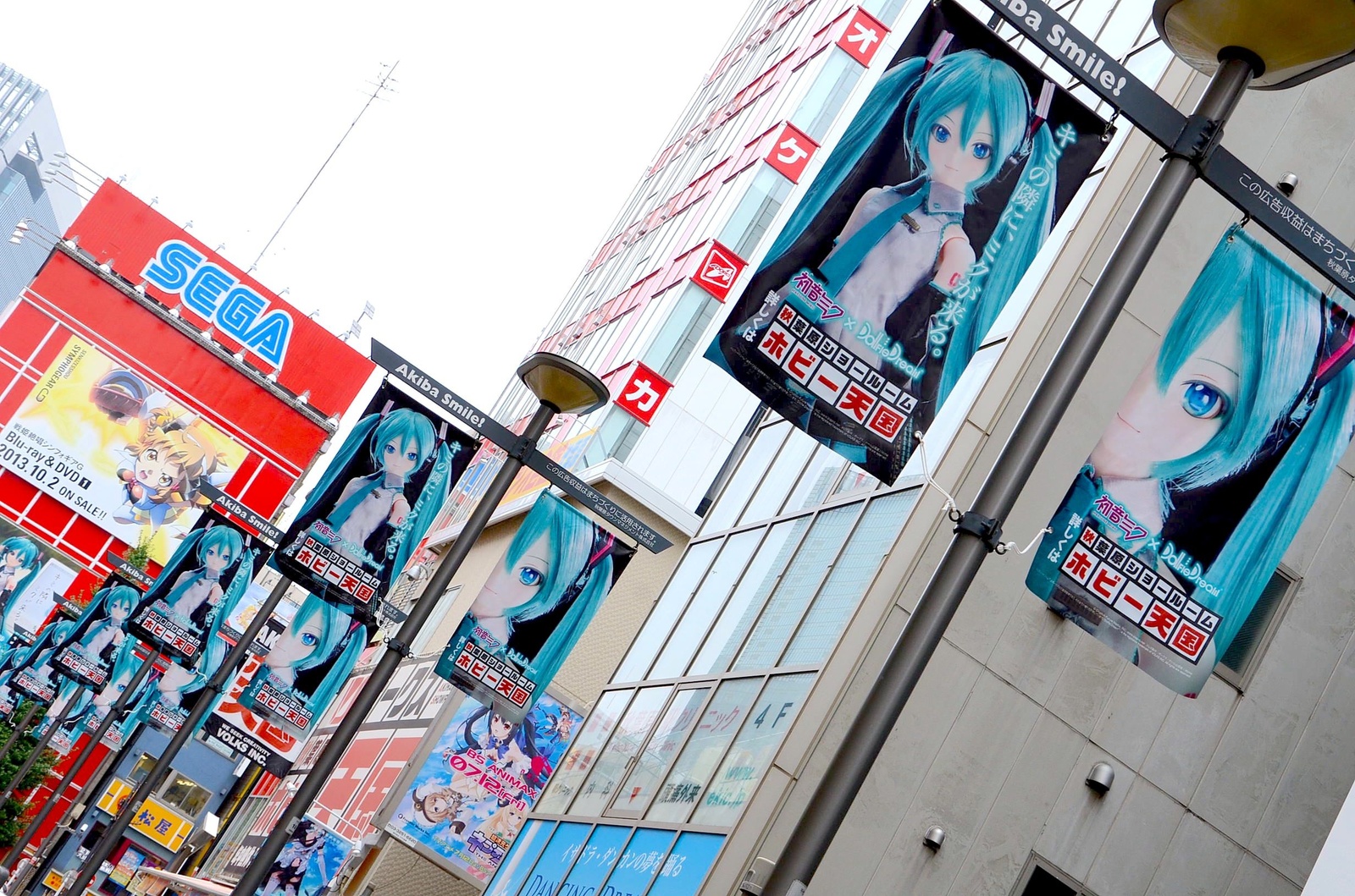 The spectacle immediately outside Akihabara train station. Hatsune Miku was throughout the whole town!  0