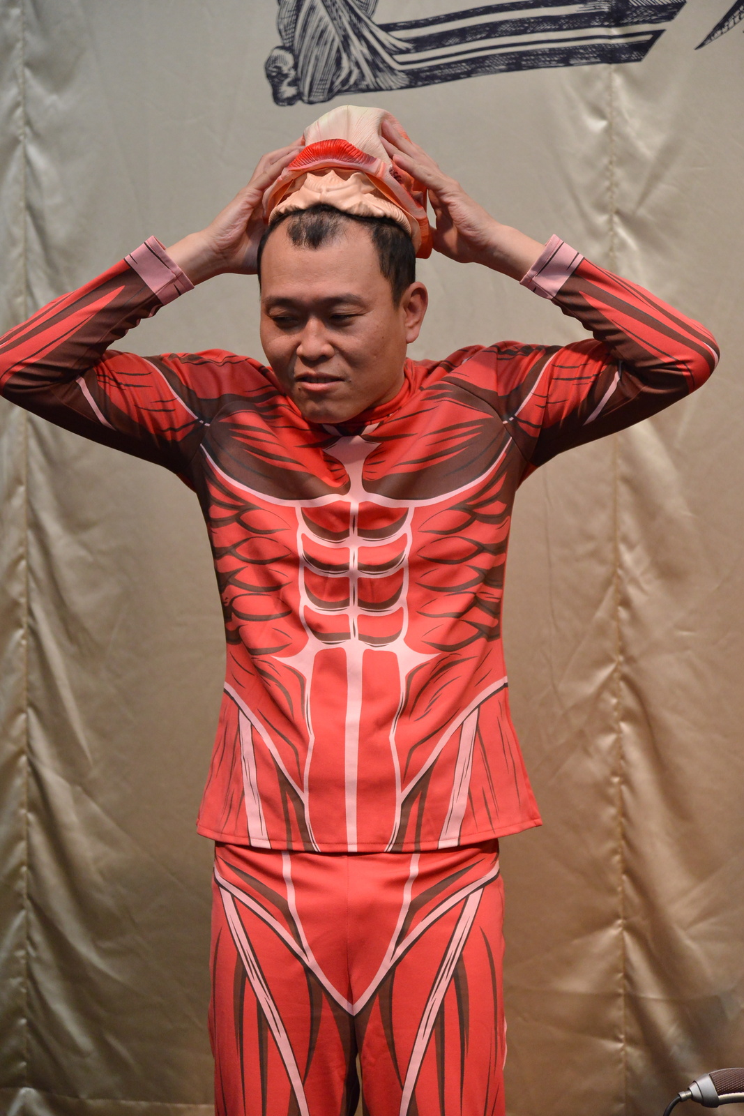 Comedian Seiji Chihara wearing a Colossal Titan costume. 3