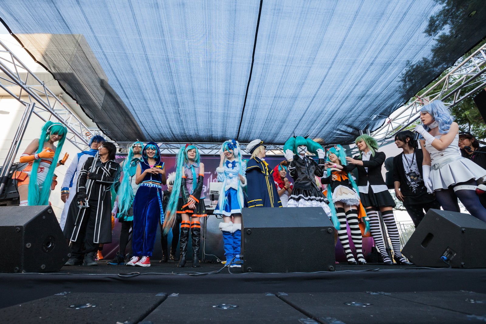 In the stage area, there was a huge gathering of all kinds of Mikus! MIKU EXPO 2014 in LA: Photo by Kumo Takeda 8